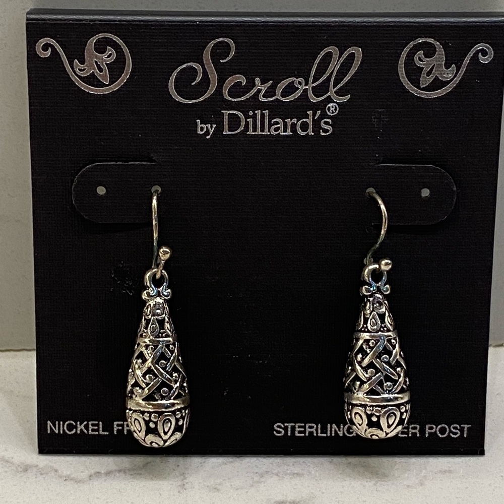 Scroll earnings. Never worn. Retailed for $20. Asking $15.
